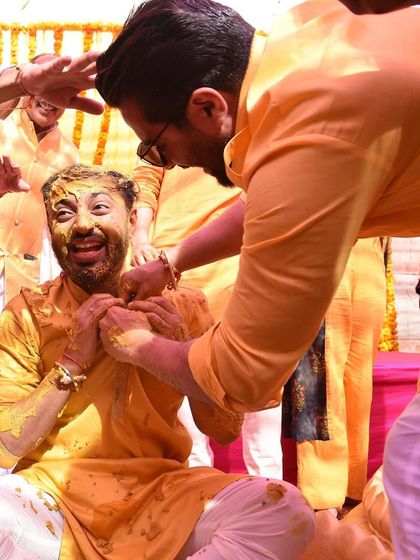 The groom's reaction during the Haldi ceremony is priceless. These are the fun, unscripted moments that I love to see.