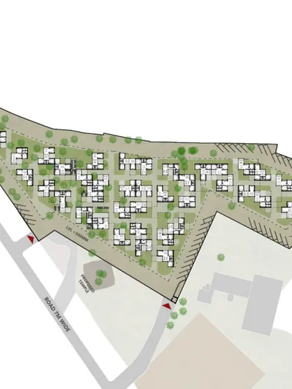 The final site plan for the Ayodhya social housing project, showing the arrangement of the modular units to form a network of buildings, courtyards, and green pathways.