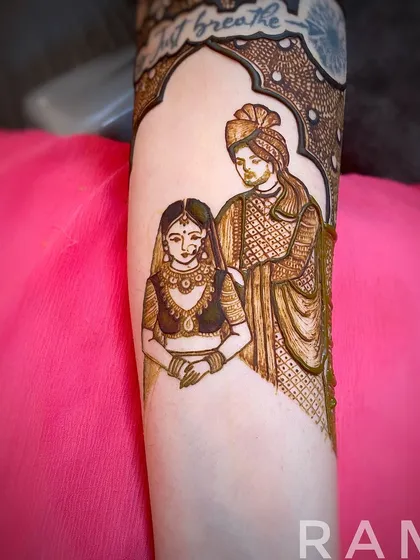 The finished couple portrait, with both the bride and groom fully detailed and shaded. The initial sketch has now become a complete, romantic scene.