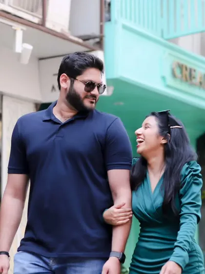 A playful and candid moment during a pre-wedding shoot in the city. I love capturing the real laughter and interactions that happen when a couple is just enjoying their time together.