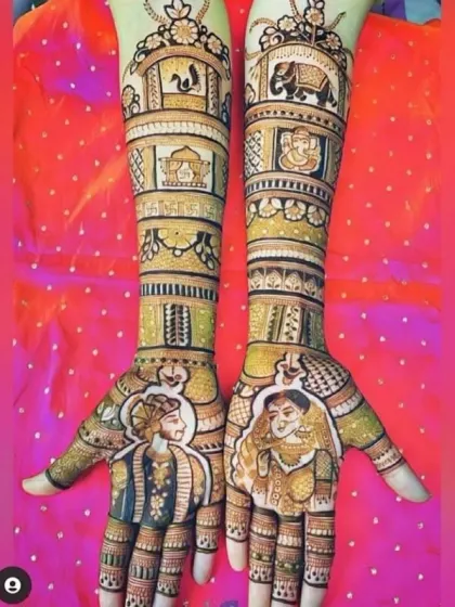 A multi-layered storytelling design. The palms feature clear bride and groom portraits, while the forearms depict various scenes in panels, including elephants, deities like Ganesha, and other symbolic elements.