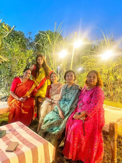 A group of lovely ladies enjoying a festive get-together at the farm. The natural backdrop and soft lighting create a perfect setting for photos.