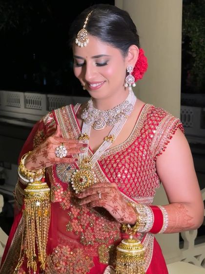 Every detail matters. Here you can see how the makeup complements the intricate details of her jewelry and the traditional kalire, creating a cohesive and stunning bridal portrait.