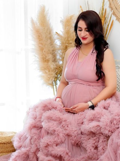 A variety of poses in a beautiful ruffled pink gown, showing its versatility for creating soft, romantic, and glamorous solo maternity portraits.