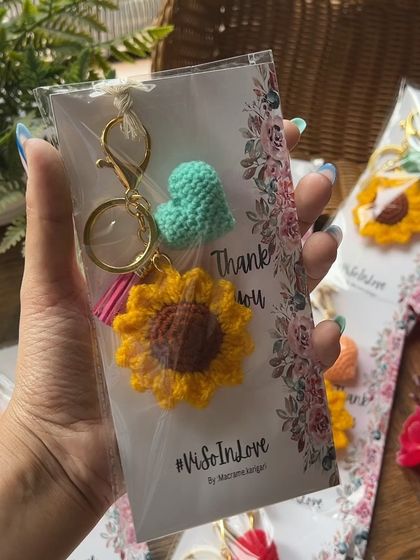 Our sunflower keychain paired with a small heart charm and tassel, beautifully packaged with a "Thank You" card. These are a favorite for wedding favors and bulk gifting.