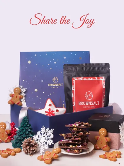 Our gifting solutions go beyond a single season. Here is our "Share the Joy" Christmas hamper, filled with festive treats like gingerbread cookies, chocolate barks, and our special Xmas Granola. It shows our capability to create unique, themed hampers for any corporate celebration throughout the year.