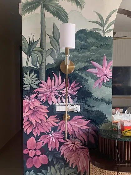 This angle highlights the rich colors and details of the foliage and flowers in this tropical wall painting. Each leaf and petal is hand-painted to contribute to the overall lush feel of the piece.