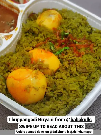 A close-up of my Thuppangadi Egg Biriyani, as featured in an article by a food blogger. The rich color of the rice comes from the authentic Kundapur spices, and the boiled eggs absorb all the wonderful flavors of the 'thuppa' and pepper.
