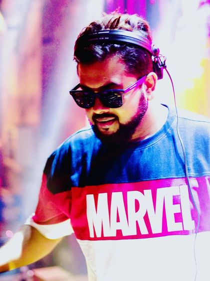 If you change the way you look at things, the things you look at change. A close-up shot of me in the zone at the DJ booth.