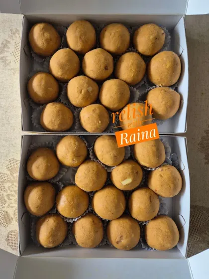 A top-down view of my Besan Laddoos, neatly packed and ready to be enjoyed. I can make them with sugar for a softer texture or jaggery for a firmer one.