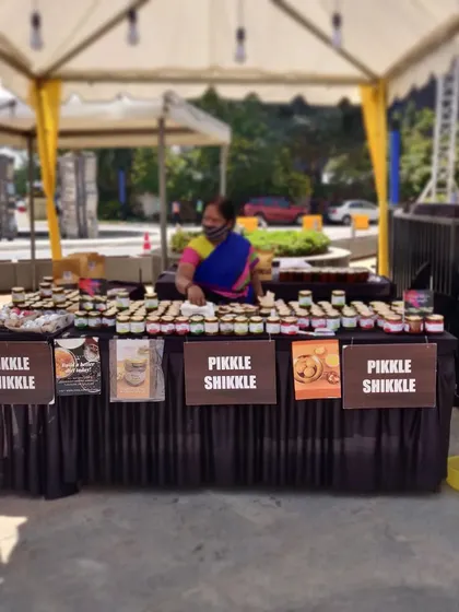 Another angle of our market stall, showcasing the neat arrangement of our pickle and jam jars.