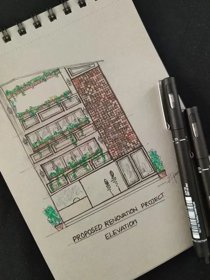 A sketch is a vision on paper. This hand-drawn elevation for a proposed renovation project was the first step in conceptualizing the building's new facade with its brick and greenery elements.