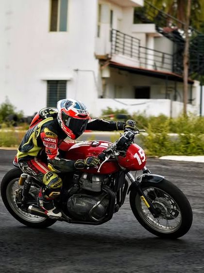 A rider with excellent form cornering on a GT 650 during a personal training session.