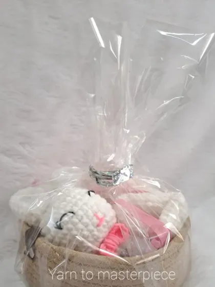 All my gift hampers come beautifully wrapped and ready to give. Here is the pink and white set packaged in clear cellophane with a silver tie.
