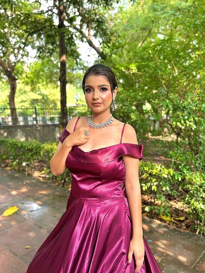 A close-up of our off-shoulder pre-wedding gown. The rich satin fabric and elegant design make it a favorite for photoshoots.