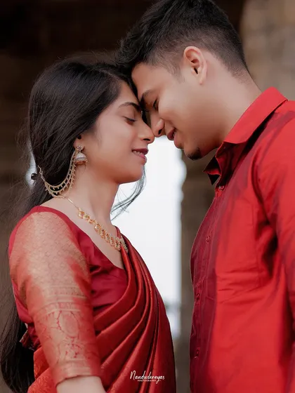 A tight close-up of a couple about to kiss, capturing the anticipation and intimacy of the moment.