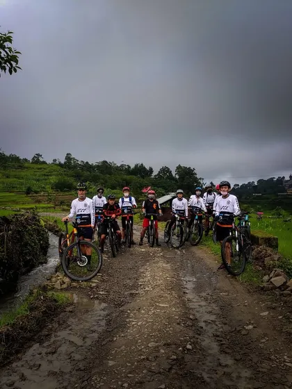 A group of young riders ready to take on a muddy trail. We are passionate about building the next generation of mountain bikers in India.