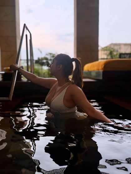 Another angle from the pool, showing the relaxing atmosphere and elegant design of the space.