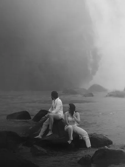 A quiet moment of reflection for Gokul and Vandana by the powerful falls. This black and white shot emphasizes the mood and atmosphere of their unique vow renewal location.