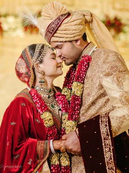 An intimate and tender moment between the bride and groom during their Pushkar palace wedding, capturing the love that is at the core of the grand celebration.