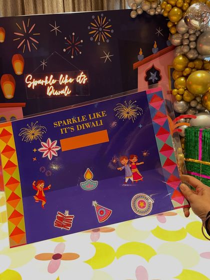 I love creating a complete festive experience. Here's one of my custom craft kits, perfectly matching the 'Sparkle like it's Diwali' theme of the party decor.