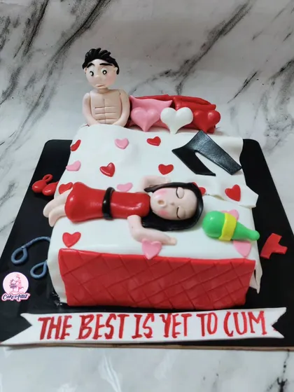 Another naughty cake for a bachelorette party! This one features a bed scene and is sure to get a lot of laughs.