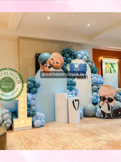 Another angle of the Boss Baby setup, showing the themed plinths, one with a tuxedo print.
