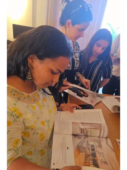 These moments belong to the team. A collection of photos showing my dedicated colleagues exploring our recent feature in Architecture + Design magazine. Their spirit is what makes every project come alive.