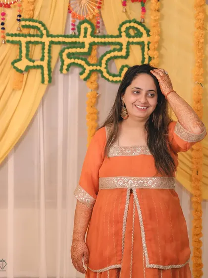 A candid, happy moment from the Mehandi ceremony.
