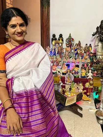 Celebrating the first day of Navaratri at home, surrounded by the traditional Golu display of dolls. This festival is a special time for us, filled with music, dance, and devotion to the Goddess.