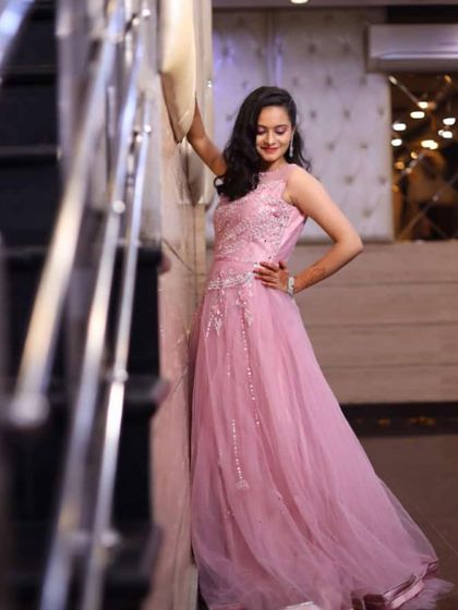 A full-length shot of this elegant pink rental gown, showing its graceful fall. It’s a comfortable yet glamorous option for a long night of celebrations.