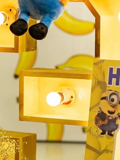 A close-up of the light-up letters from the Minions party. These custom props add a fun, graphic element to the decor and look fantastic in photos.