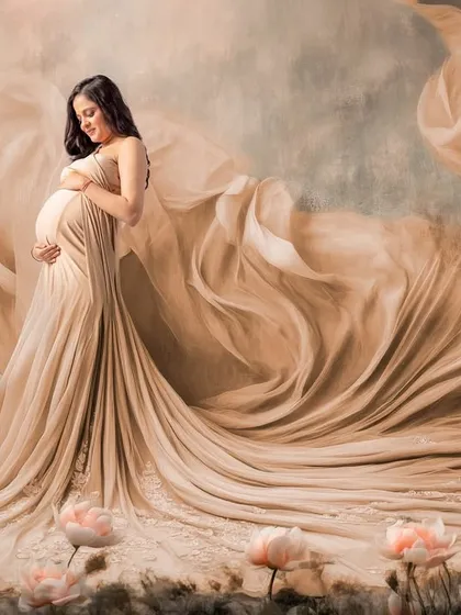 This is what a dream setup looks like. For this fine art maternity portrait, I used flowing fabrics and a digitally enhanced floral landscape to create a truly magical, painting-like memory for this mommy-to-be.
