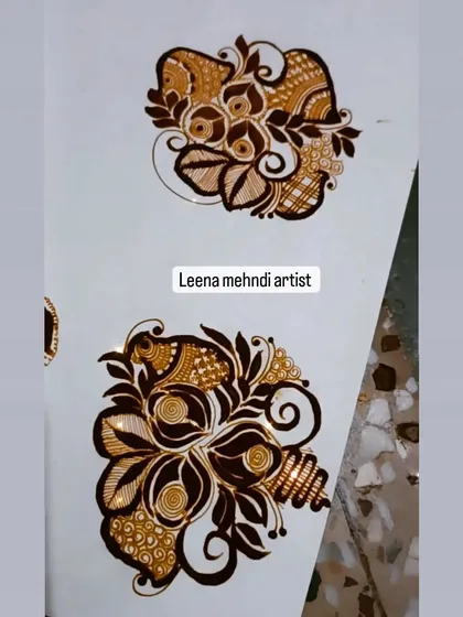 A practice sheet with two different floral bunch motifs.