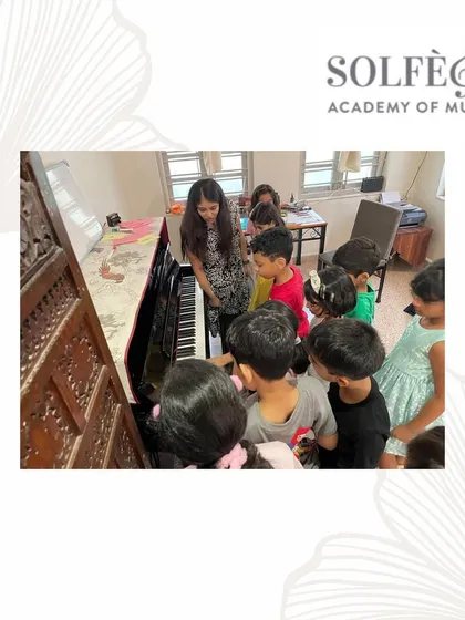 Curiosity is the first step in learning. I captured this moment during a music theory workshop where the children gathered around the piano, eager to see how the notes they learn on paper translate into sound. We encourage this hands-on exploration in our group piano classes.