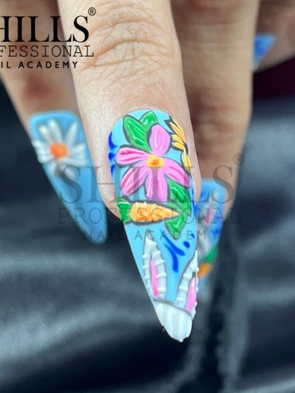 Another angle of our intricate Easter nail art, showing the depth and detail of the hand-sculpted elements.