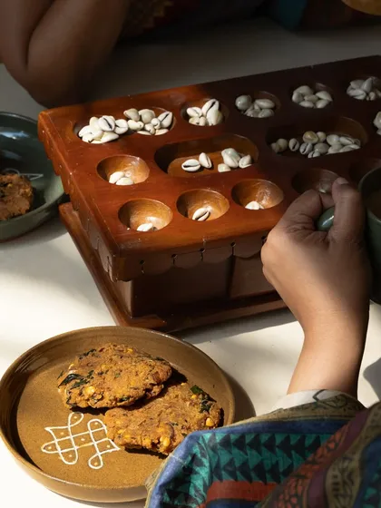 A moment of quiet ritual with pieces from the 'Kolam' collection. The patterns, drawn with rice flour in my childhood, are here captured permanently in clay, a tribute to home and memory.