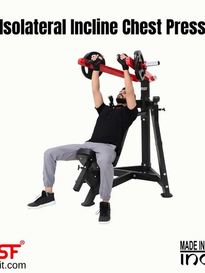 The Isolateral Incline Chest Press in action. This plate-loaded machine allows for independent arm movement, ensuring balanced development of the upper pectoral muscles.