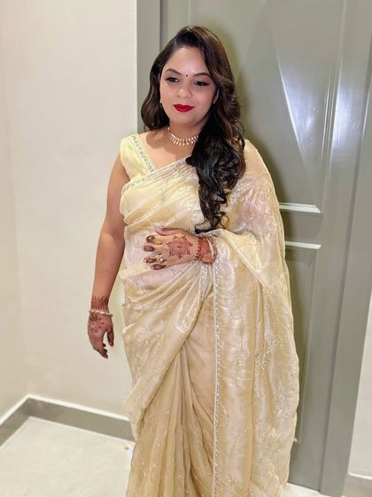 A side profile of the client, showing her beautiful hairstyle.