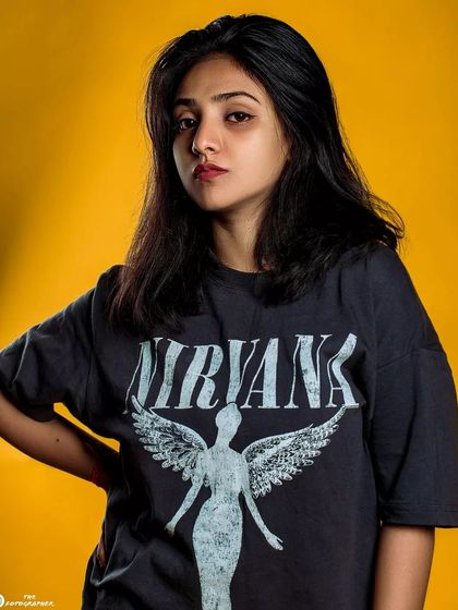 A similar shot with a slight change in expression, providing a great alternative for a portfolio that needs a clean, high-energy look.