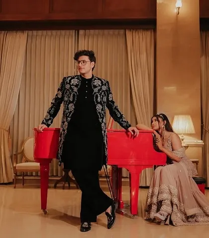 We had the pleasure of dressing YouTuber Triggered Insaan for a mehendi event in this custom black velvet Indowestern sherwani. The jacket features elaborate silver floral and paisley embroidery, creating a look of pure royalty.