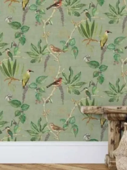 The bird and vine pattern in a soft green. This colorway enhances the natural feel of the design, making it a great choice for a living room or bedroom.