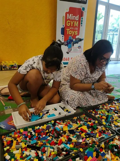 Two participants working together on their LEGO creation. Our workshops often involve teamwork, helping kids develop social and collaborative skills.