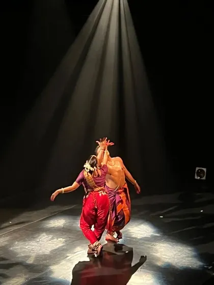 A powerful moment from "Antardweep," a collaborative production with Dr. Prachi Mehta Jariwala. This duet explores the concept of the body as a temple, blending the forms of Bharatanatyam and Odissi to create a unique dialogue between two classical dance styles.