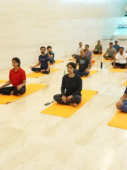 A wellness session in progress at ONGC, BKC Mumbai. The focus is on creating a peaceful and supportive environment where employees can disconnect from work pressures and reconnect with themselves.