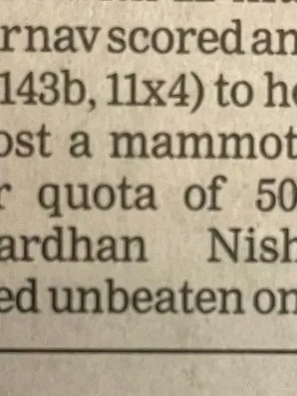 The text describing Arnav's unbeaten score and his role in the team's large total.