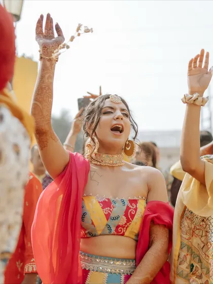 The bride, full of energy and joy, dances her heart out. We aim to create an atmosphere where everyone feels free to celebrate.