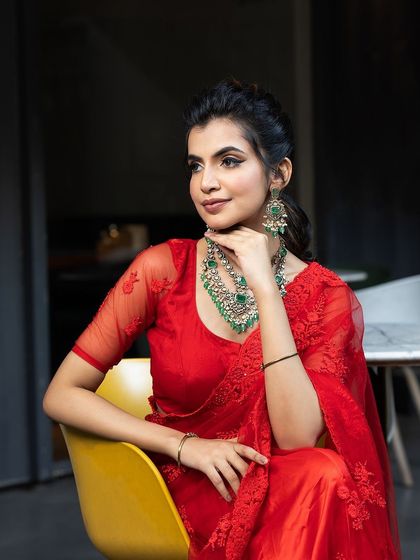 A modern and chic pose. The elegant Victorian jewellery adds a touch of sophistication, making it perfect for a cocktail party or reception.