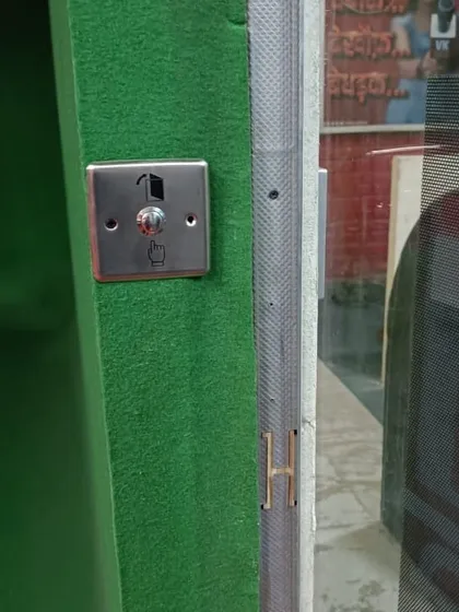 This is a push-to-exit button installed for a door access control system. It allows for easy and quick egress from a secured area without needing a key or card.