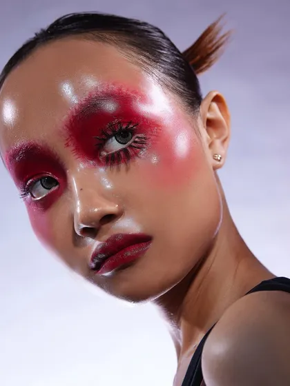 A powerful and direct shot of the red glass skin look, highlighting the intense color and glossy finish.